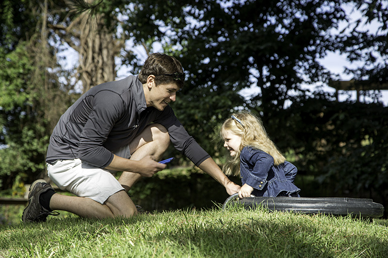 A father and daughter explore the Nature PlaySpace