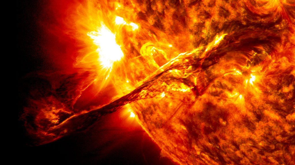 A solar prominence erupts