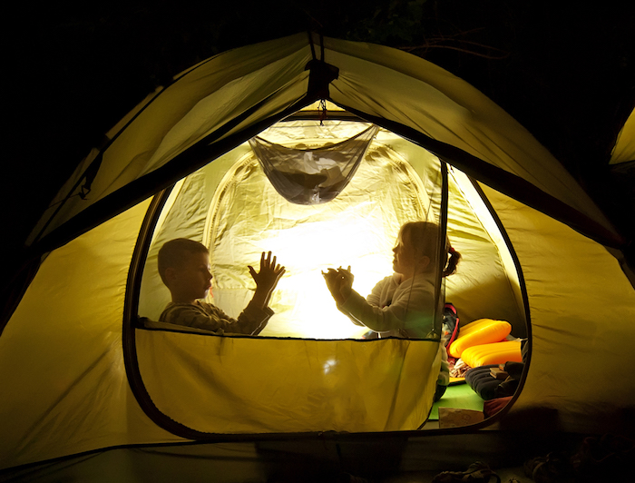 Kids are camping in their backyard!