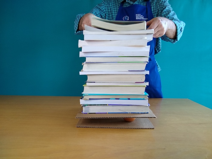 There is now a tower of books! Still no cracks.