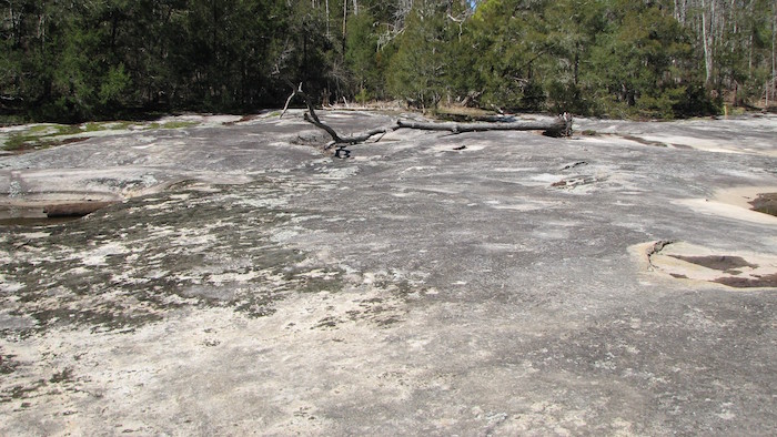 A flat granite ground.