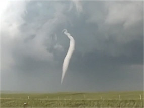 Tornado over a wide field.