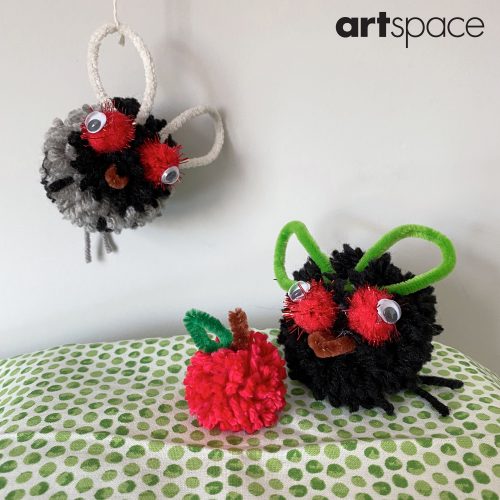 Little flies made from pom-poms