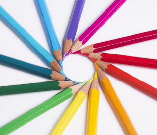 Different colors of pencils forming a star shape