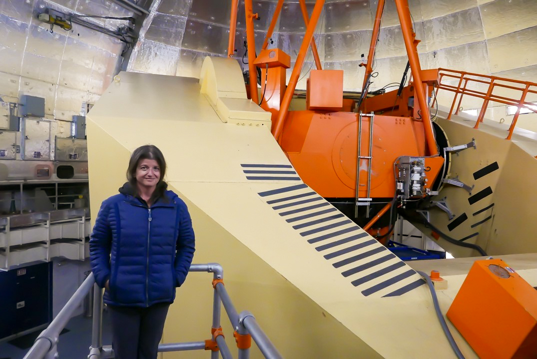 Dr. Rachel Smith inside the IRTF telescope dome