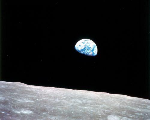 A photo of Earth rising from the vantage of the moon