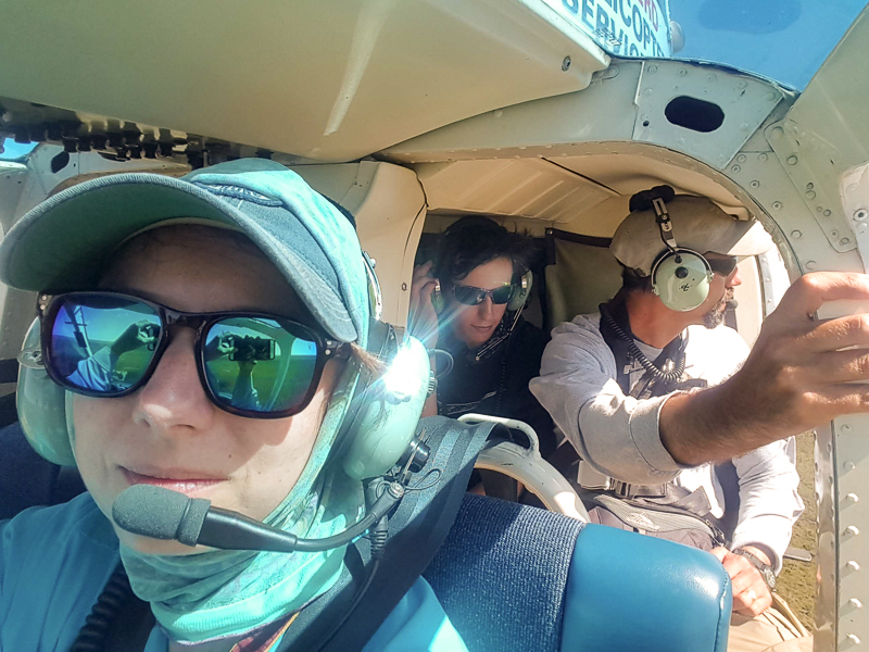 Dr. Ami Thompson chasing dragonflies in a helicopter.