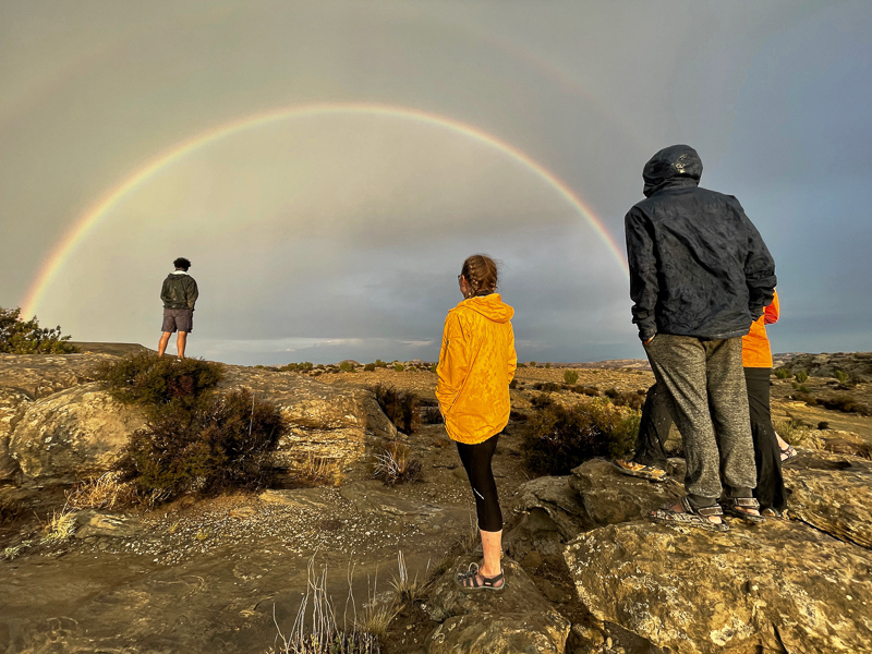 The team observes a double rainbow in Utah.