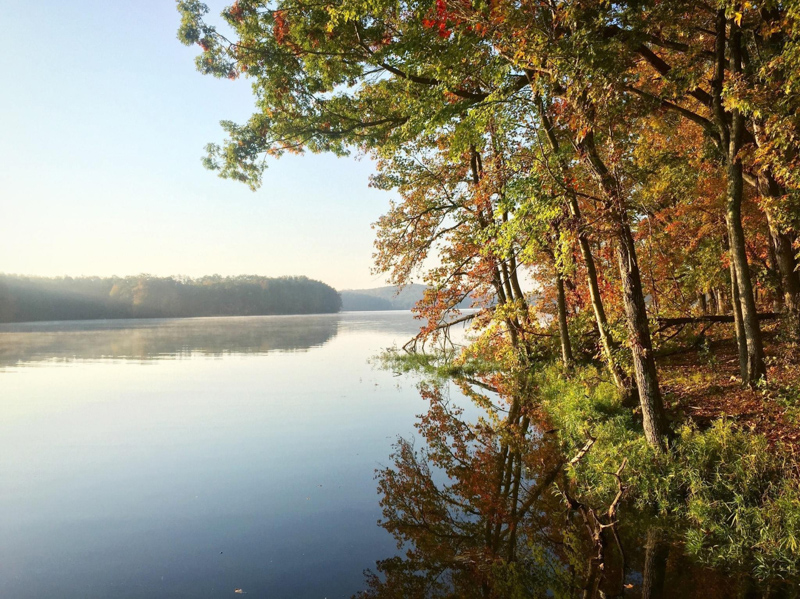 Lake surrounded by autumn trees in the Uwharries.