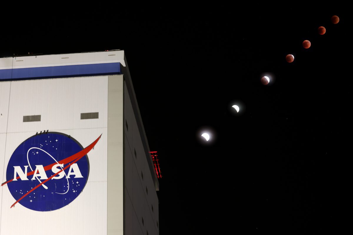 The Flower Moon lunar eclipse over NASA’s Michoud Assembly Facility in New Orleans is shown from the initial partial eclipse to totality in a composite of seven images shot on Sunday, May 15, 2022.
