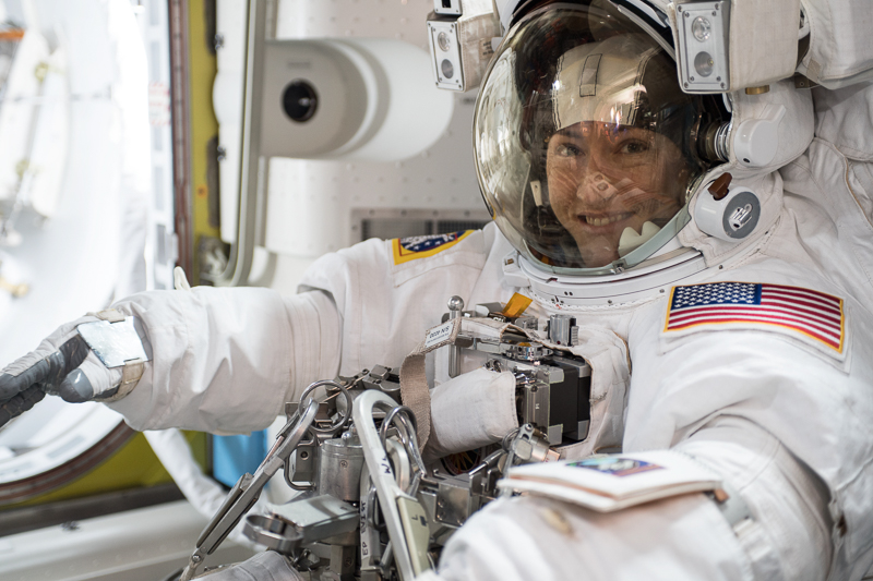 NASA astronaut Christina Koch is suited up in a U.S. spacesuit before beginning a seven hour and one minute spacewalk in 2019.