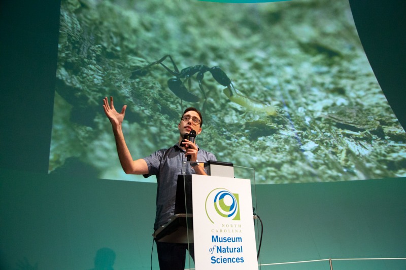 Dr. Adrian Smith gives a talk in the SECU Daily Planet Theater at BugFest 2016.