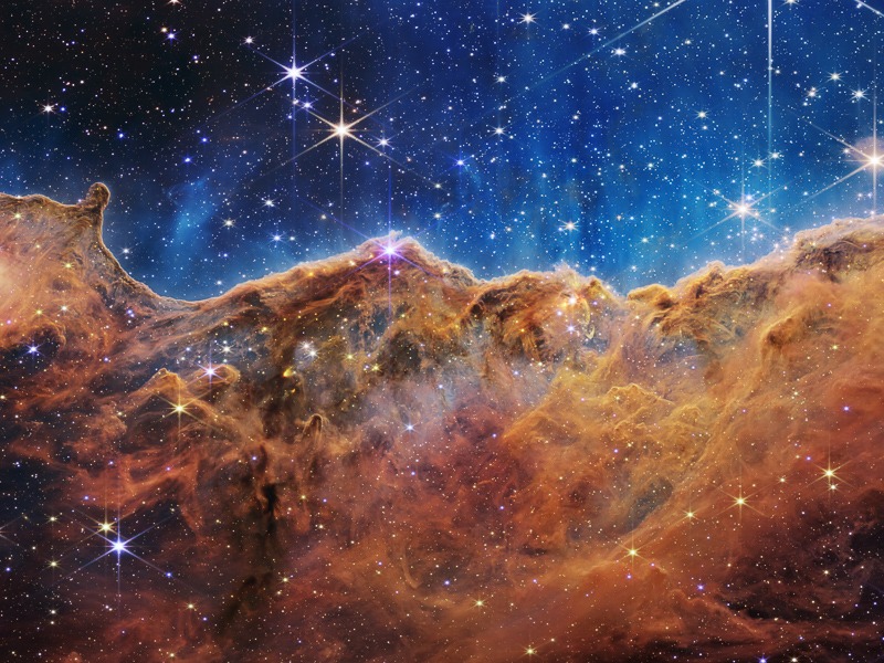 Cosmic Cliffs of the Carina Nebula, taken with the James Webb Space Telescope.