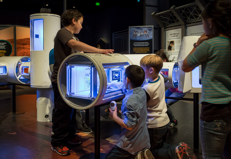 Children exploring the Journey to Space special exhibition.