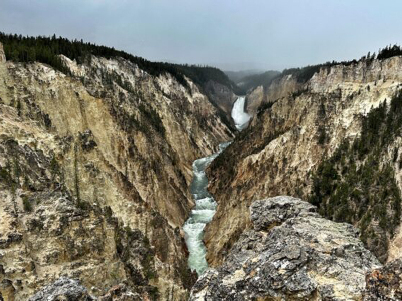 Snow moving in over the Lower Falls of the Yellowstone River.
